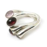 A Georg Jensen Carnival silver two-piece ring set, model no. 263, each streamlined form set with