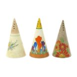 'Crocus' a Clarice Cliff Bizarre Conical sugar sifter, painted in colours between yellow and brown