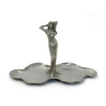 An Art Nouveau W.M.F pewter tray, modelled as a woman rising from the centre of two foliate