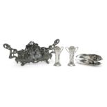 An Art Nouveau W.M.F twin-handled pewter centrepiece, cast in low relief with Art Nouveau maidens