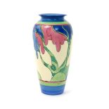 'Rudyard' a Clarice Cliff Bizarre 120 vase, painted in colours between pink, green and blue bands,