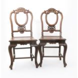 A Pair of Chinese rosewood chairs from the Chinese Restaurant at the British Empire Exhibition,