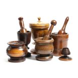 A collection of treen, comprising: a lignum vitae mortar, 17th / 18th century, the body with