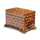 λ An early 19th century cube parquetry tea caddy, inlaid with rosewood, birch and mahogany, the