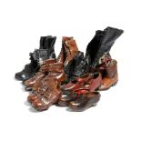 A collection of ten pairs of vintage leather boots and shoes, including: a pair of 'Stanley