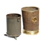 A French brass waste paper basket, with wreath handles, the body all over decorated with fleur-de-