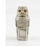 A French novelty silver owl scent bottle and desk seal, modelled as an owl perched on a plinth,