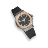 HUBLOT - a lady's rose gold and titanium Classic Fusion wrist watch reference 581.NO.1181.RX,