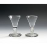 A small pair of Dutch firing glasses, 2nd half 18th century, with drawn trumpet bowls raised on