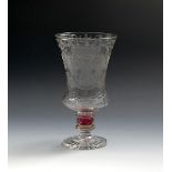 A Saxon armorial goblet, 19th century, the thistle-shaped bowl engraved with two armorial shields