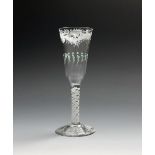 A rare Beilby ale glass, c.1770, the tapering funnel bowl lightly moulded with flutes and