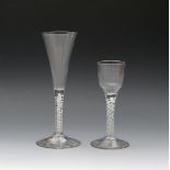 Two wine glasses, c.1760-70, one with a tall trumpet bowl rising from a double series airtwist stem,