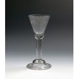 An Irish Williamite goblet of large proportion, c.1750-60, the goblet bowl engraved with the dates