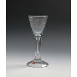 A privateer wine glass, c.1780, the drawn trumpet bowl engraved 'J Barton / Success to the Unity',