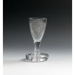 A Williamite firing glass, mid 18th century, perhaps later engraved with the profile of King William