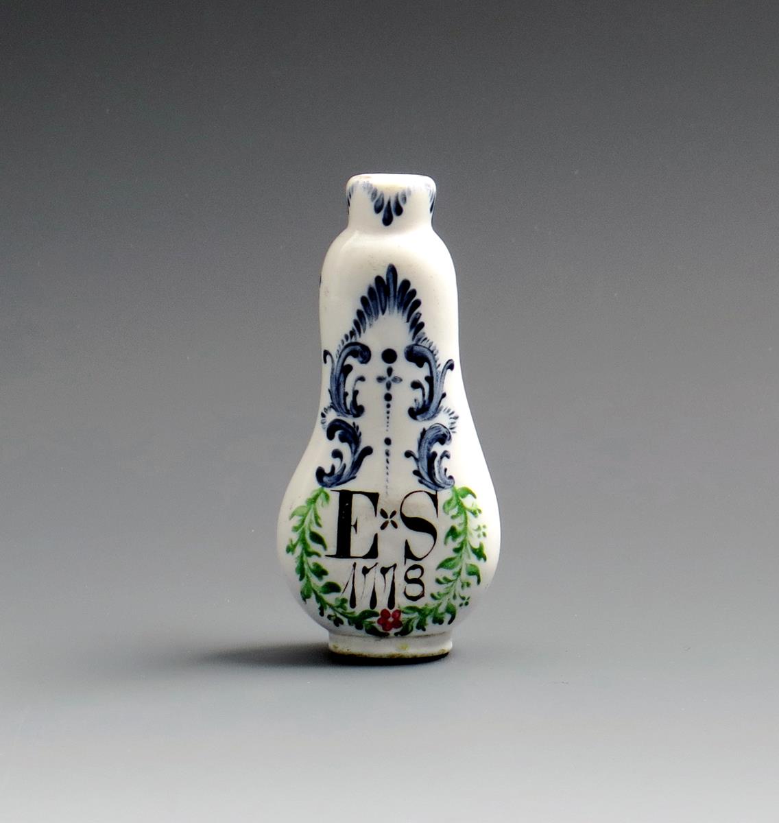 A rare white opaque glass scent bottle, dated 1778, probably Beilby, Newcastle-upon-Tyne, of