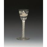 A Beilby wine glass, c.1770, the rounded funnel bowl enamelled in white with an obelisk between