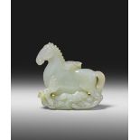 A FINE CHINESE WHITE JADE CARVING OF LONG MA 18TH CENTURY Transforming into a qilin and emerging