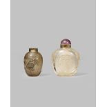 TWO CHINESE ROCK CRYSTAL SNUFF BOTTLES 19TH CENTURY The larger carved of translucent crystal with