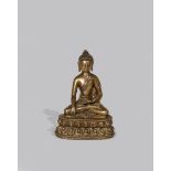 A TIBETAN COPPER INLAID BRONZE FIGURE OF BUDDHA SAKYAMUNI 14TH CENTURY Sitting in vajraparyankasana,