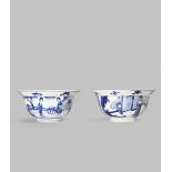 TWO CHINESE BLUE AND WHITE BOWLS KANGXI 1662-1722 Each with a deep tapering body painted to the