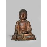 A CHINESE GILT AND LACQUERED BRONZE FIGURE OF BUDDHA SAKYAMUNI MING DYNASTY Seated in