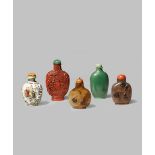 FIVE CHINESE SNUFF BOTTLES 19TH CENTURY Two ceramic, one plain green, one moulded with figures,