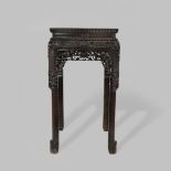 A CHINESE HARDWOOD INCENSE STAND OR TABLE LATE QING DYNASTY With a square top and an apron carved