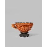 A RARE CHINESE IMPERIAL CORAL CUP 18TH CENTURY The oval lobed body with a handle, inlaid in coral on