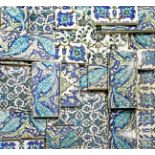 A LARGE COLLECTION OF IZNIK-STYLE TILES 19TH CENTURY Painted in blue, turquoise, aubergine and green