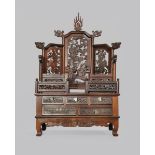 A CHINESE HARDWOOD BUDDHIST SHRINE STAND LATE QING DYNASTY The superstructure with seven reticulated