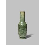 A CHINESE SPINACH-GREEN JADE VASE 18TH CENTURY With a slender neck and a cylindrical body carved