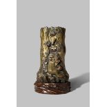 A JAPANESE MIXED METAL VASE MEIJI 1868-1912 Depicting three monkeys against a hollowed tree trunk,