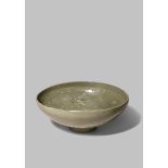 A KOREAN CELADON BOWL KORYO DYNASTY Decorated to the exterior with three flowerheads in medallions