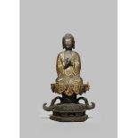 A KOREAN GILT BRONZE FIGURE OF BUDDHA KORYO/CHOSON DYNASTY Sitting in dhyanasana on a high lotus