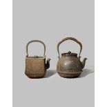 TWO JAPANESE CAST-IRON KETTLES AND COVERS, TETSUBIN EDO/MEIJI PERIODS One of bulbous shape, the body