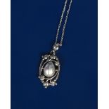 A Liberty & Co silver pendant necklace, the pierced silver oval pendant decorated with sprays of