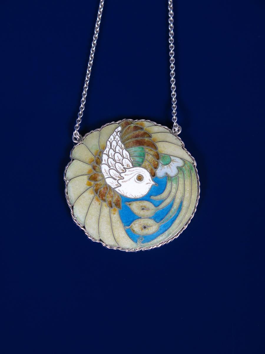 A cloisonne enamel pendant necklace by Harold Stabler, circular form with simple rope-twist border