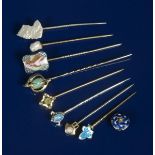 A Murrle Bennett silver stick pin, with shield terminal set with an opal, a Child & Child stick