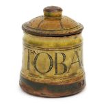 A Winchcombe Pottery tobacco jar and cover by Michael Cardew, cylindrical form, incised Tobacco