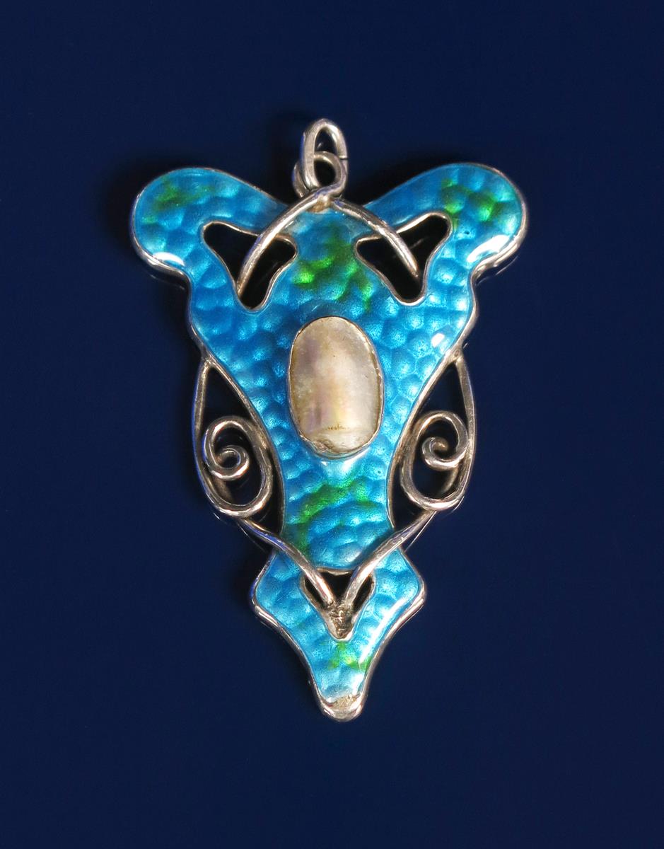 An Art Nouveau silver and enamel pendant, the floriform body enamelled in shades of blue and