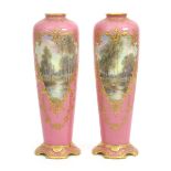 A pair of Royal Doulton porcelain cabinet vases by Joseph Hancock, slender, shouldered form on