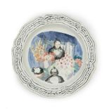A Wedgwood plate by Therese Lessore, painted to the well with a lady selling flowers, in colours