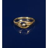 An Art Nouveau gold ring probably by Murrle Bennett, the pierced floriform design set with small