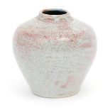 A Mortlake Pottery vase by George J Cox, dated 1912, shouldered form covered in a mottled pink and
