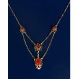 A Birmingham school silver and carnelian necklace, cast flowerhead design set with a carnelian