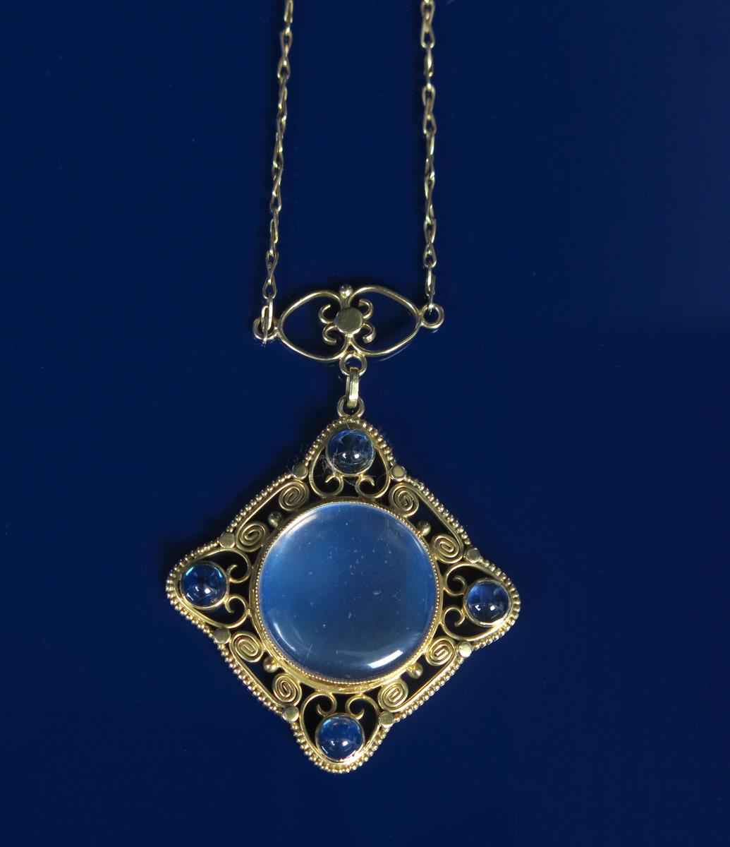 A Liberty & Co gold, sapphire and moonstone pendant necklace, the square section pierced wirework