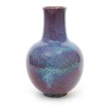 A Ruskin Pottery high-fired stoneware vase by William Howson-Taylor, dated 1909, ovoid with