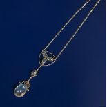 A silver and moonstone pendant necklace probably Liberty & Co, the worked, wirework frame supporting