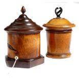 A 19th century treen lignum vitae string box, with a screw-off cover, cylindrical body and a